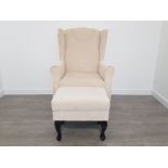 MODERN WINGBACK ARMCHAIR WITH MATCHING FOOT STOOL IN A NICE CREAM FABRIC