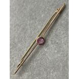 9CT GOLD LADIES BROOCH SET WITH PINK STONE