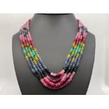 MULTI STRAND BEADS NECKLACE WITH RUBIES EMERALDS AND SAPPHIRES