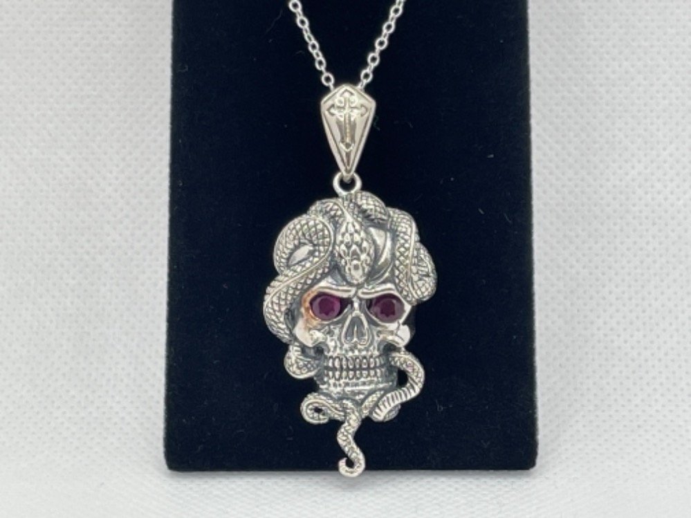 SILVER SKULL PENDANT WITH RUBILITE EYES AND CHAIN 43CM IN LENGTH PENDENT 4CM IN LENGTH