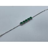 SILVER CZ AND GREEN STONE BRACELET APPROXIMATELY 20CM IN LENGTH EXTENDED