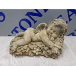 STONEWARE BACCUS CHERUB ON A BED OF GRAPES