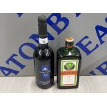 2 BOTTLES OF ALCOHOL INCLUDING A LARGE BOTTLES OF JAGERMEISTER AND A BOTTLE OF HARVEYS BRISTOL CREAM