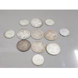7 VICTORIAN FLORINS AND 5 VICTORIAN AND EDWARDIAN SHILLINGS IN WORN CONDITION 98.7G