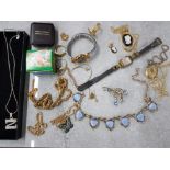 COLLECTION OF COSTUME JEWELLERY INCLUDING A LOCKET, PENDANT ON CHAIN, NECKLACES, RINGS, A BROOCH AND