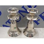 PAIR OF INDIAN CANDLE HOLDERS IN WHITE METAL WITH INLAID POLISHED HARDSTONE CABOCHONS