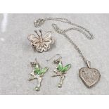 3 SILVER ITEMS INCLUDING A BUTTERFLY BROOCH, TINKER BELL EARINGS WITH GREEN STONES AND A HEART