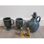 COLLECTION OF WADE POTTERY ITEMS INCLUDES 2 IRISH COFFEE MUGS, POTEEN JUG AND 2 SMALL FIGURES