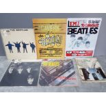 BEATLES MEMORABILIA TO INCLUDE 3 LP RECORDS, 2 TIN PLATE ADVERTISING PANELS, SONG BOOK AND