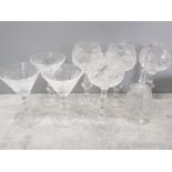 7 PIECES OF NICELY ETCHED EDINBURGH CRYSTAL DRINKING GLASSES ALSO INCLUDES GLASS BELL