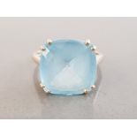 LADIES 10CT YELLOW GOLD BLUE STONE RING FEATURING A LIGHT BLUE STONE SET IN A DOUBLE FOUR CLAW