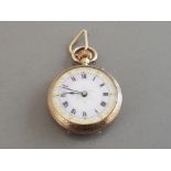 9CT YELLOW GOLD SMALL POCKET WATCH WITH PINK AND WHITE DIAL WITH GOLD DETAILING