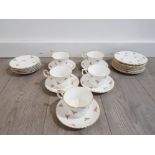 APPROXIMATELLY 24 PIECE PART TEA SET OF FLORAL POTTERY SIGNED INDISTINCT