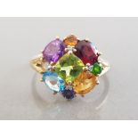LADIES 9CT YELLOW GOLD STONE SET CLUSTER RING FEATURING 1 GARNET 1 AMETHYST 1 BLUE TOPAZ 2 CITREEN 1
