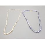 LAVENDER PEARL NECKLACE WITH 14K CATCH 48CM TOGETHER WITH CULTURED PEARLS NECKLACE WITH SILVER CATCH