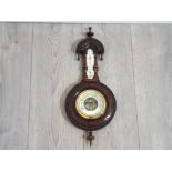 Vintage mahogany barometer with brass dile 46 cm in length