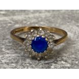 9ct gold blue and white stone round cluster ring, 2.2g gross size R