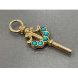 Antique 9ct gold watch key set with turquoise stones