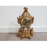 Ornate gilt french style mantle clock