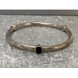 Silver hollow slave bangle set with amethyst cornelian and onyx, 9.2g gross