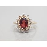 9ct yellow gold garnet cluster ring with surround of 12 faceted white stones size o1/2 3.5g gross