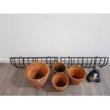 2 cast metal garden wall baskets with a selection of planters etc