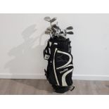 Dunlop golf bag containing golf clubs