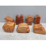 7 hardwood secret compartment boxes including bull lion rabbit hate frog fish and penguin