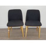 2 modern chairs with beach frames and navy/black fabric