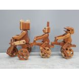 Cycling trio all link together handcarved from hardwood