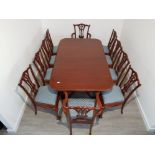 Mahogany Dining table with carved rope edge claw and ball feet with mahogany flame 8 chairs and 2