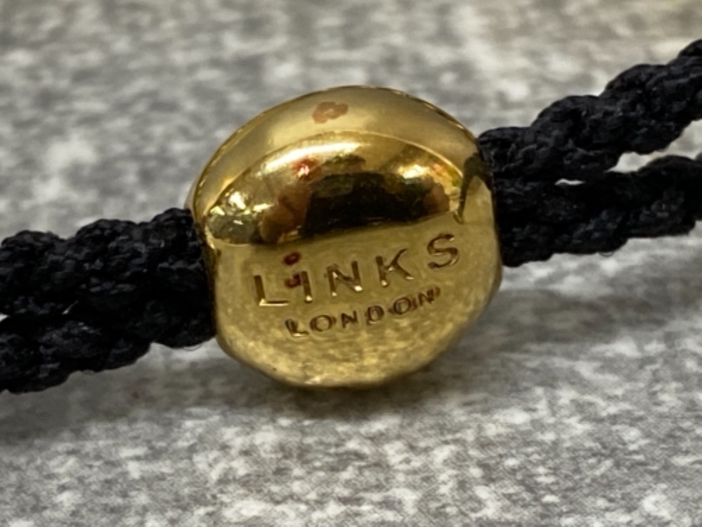 Links of London gold vermeil skull friendship bracelet with rare black colour strap and original - Image 2 of 3