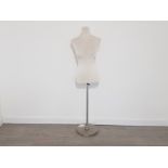 Modern mannequin on metal stand