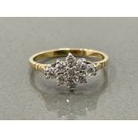 9ct gold diamond cluster ring comprising of 9 round brilliant cut diamonds approx .50ct 1.8g size N