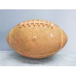 Large terracotta American football garden ornament 45cm by 31cm