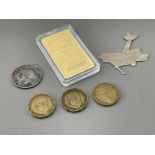 Trench art 1930 plane, double sided George VI shilling, brass threepence and credit Suisse goldstone
