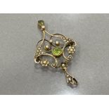 Antique 9ct gold peridot and pearl pendant/brooch set with 2 peridots and 27 pearls