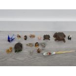 A collection of small animal figures includes wade whimsys and a royal albert country roses letter