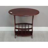 Reproduction mahogany oval shaped magazine table, 56cm x 59cm