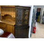 Oak glass and leaded door corner unit, fitted with below cupboards 178x86cm