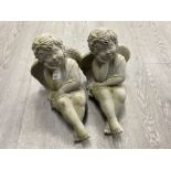 Pair of garden sitting angel ornaments, height 28cm