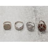 4 sterling silver dress rings in various settings