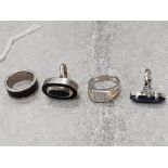 4 sterling silver dress rings with various settings