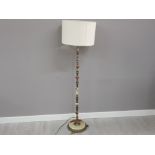 Gilt and onyx pedestal standard lamp with shade