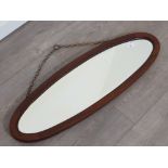 Inlaid mahogany oval shaped hanging mirror 89x29cm