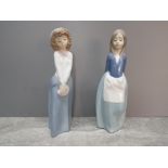 2 nao by lladro figures girl in hat holding her bag / purse and girl with hands behind her back