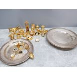 2 heavily silver plated serving plates together with a large number of minature brass clocks