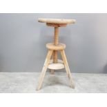 Potters rise and fall stool in solid beech seat diameter 300mm height when fully extended 600mm