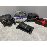 Miscellaneous items including cameras, translation machine