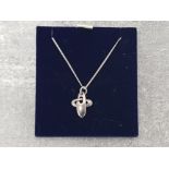 Silver celtic design pendant and chain boxed, 3.2g